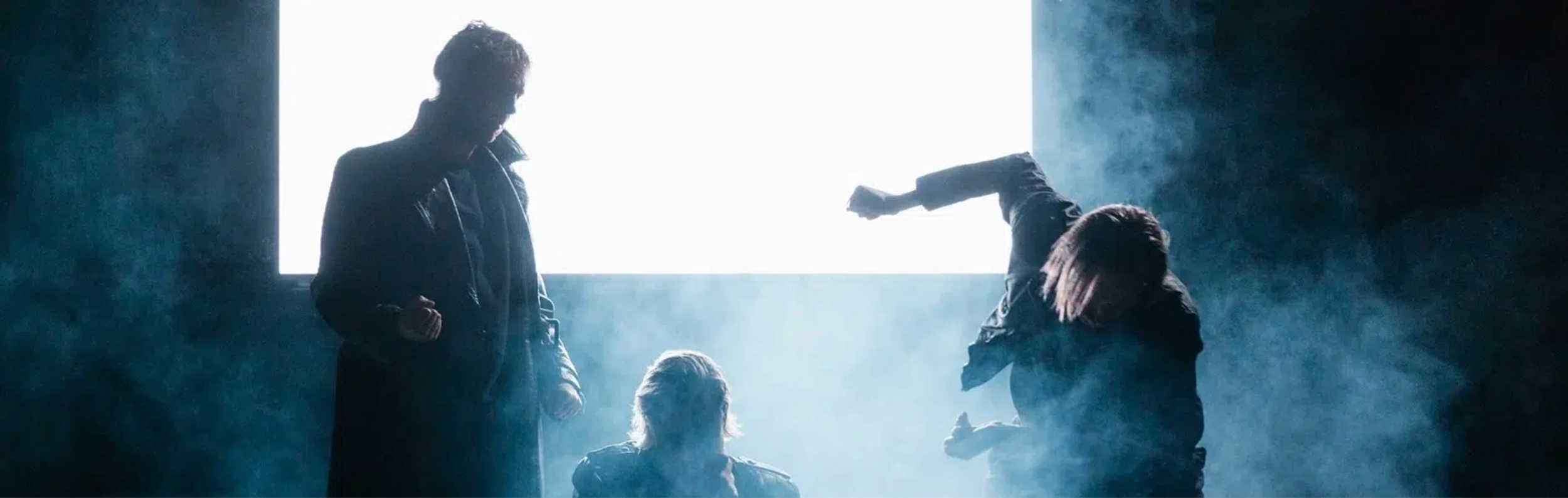 Urland Theatre Collective performing Formerly Known As, seen on stage with smoke and dramatic lighting