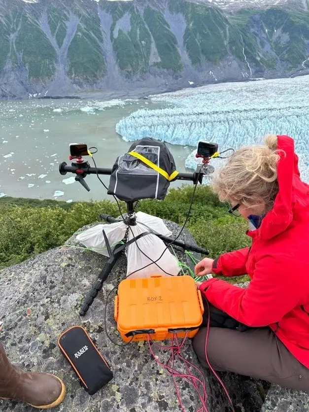 Taking scientific measurements near glacier