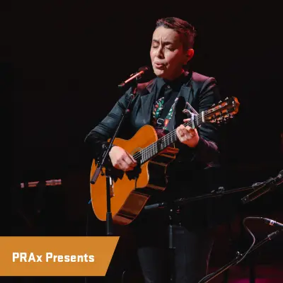 Edna Performing with Guitar