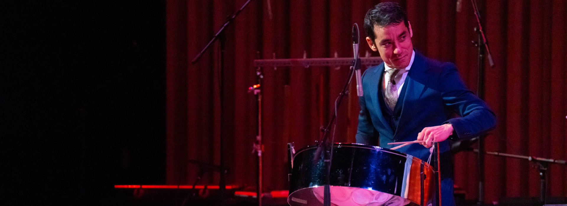Andy Akiho playing the steel pan in Detrick Hall