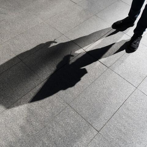 man with scary shadow